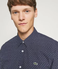 Lacoste Chemise - Bleu Marine / Blanc 11 Lacoste Chemise - Bleu Marine / Blanc -Lacoste Soldes Magasin 024abe0251d04256ab480c7d55b3282f