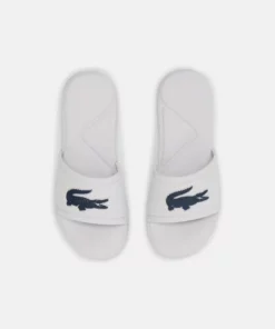 Lacoste SLIDE UNISEX - Sandales De Bain - White/dark Blue -Lacoste Soldes Magasin 0f6f6a3addbc413684d4c660f4b7e76b