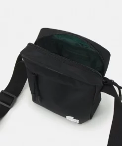 Lacoste UNISEX EXCLUSIVE - Sac Bandoulière - Noir Blanc -Lacoste Soldes Magasin 249a322934a8493a8ba74584bc9f8005