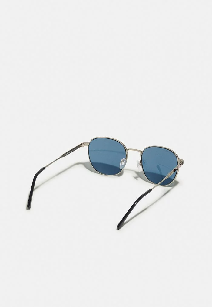 Lacoste UNISEX - Lunettes De Soleil - Gunmetal/blue 2 Lacoste UNISEX - Lunettes De Soleil - Gunmetal/blue – Image 2