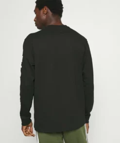 Lacoste T-shirt à Manches Longues - Noir 9 Lacoste T-shirt à Manches Longues - Noir -Lacoste Soldes Magasin 982afd87c64842b28ce2b043b00c8913