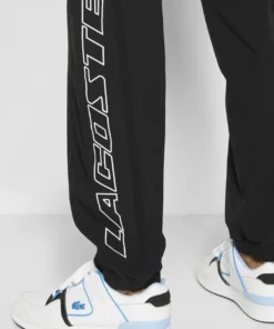 Lacoste EXCLUSIVE - Pantalon De Survêtement - Black 13 Lacoste EXCLUSIVE - Pantalon De Survêtement - Black -Lacoste Soldes Magasin 9d9cabf9f3ab4658af1e242116e2e007