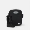 Lacoste UNISEX EXCLUSIVE - Sac Bandoulière - Noir Blanc