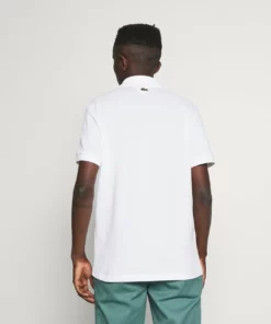 Lacoste Polo - Blanc -Lacoste Soldes Magasin c83b89d041124951aaed398e16930776