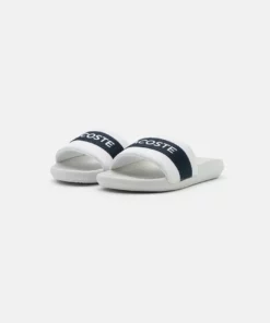 Lacoste CROCO SLIDE - Mules - White/navy -Lacoste Soldes Magasin f5f2e146ed52468db94392c2f8ddbd96